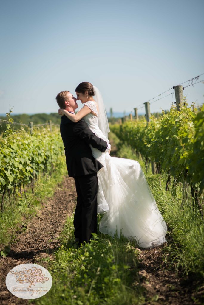 Bride and Groom in Belhurst Castle vineyard and winery