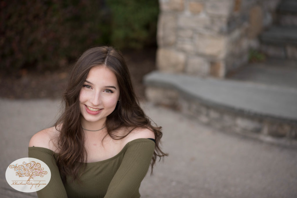 senior girl smiles for Syracuse photographer