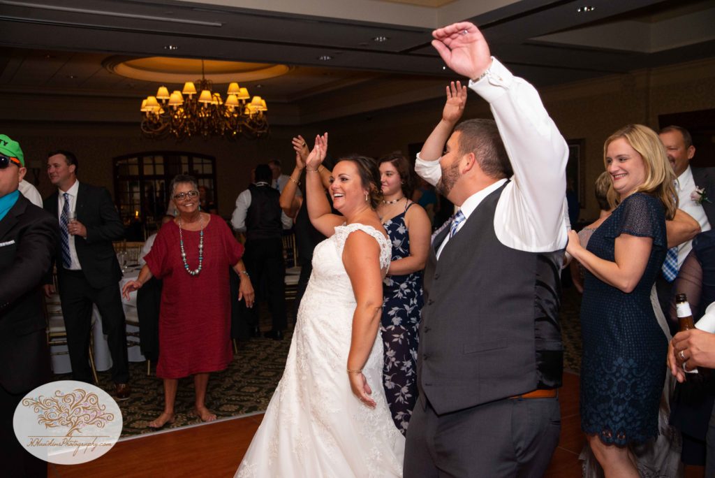 Bride and groom dance with their guests at the Shenendoah Clubhouse Turning Stone Verona NY