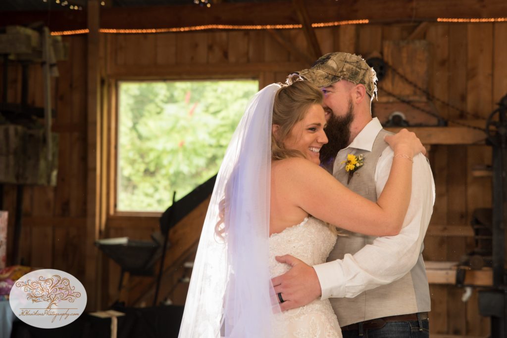 First dance shared by bride and groom during Upstate NY barn wedding captured by syracuse photographer