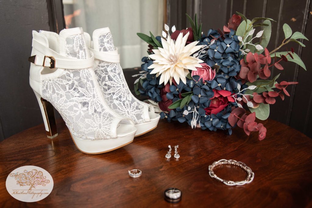 Bride's shoes, bouquet, earrings, rings and bracelets