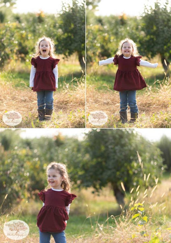 Adorable little girl in a red shirt for her portrait session