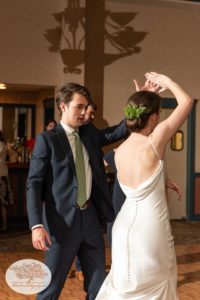 Bride and her brother dance a