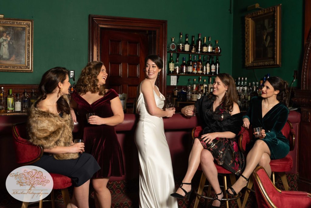 Bride and her girlfriends at Edgar's speakeasy bar in Belhurst Castle