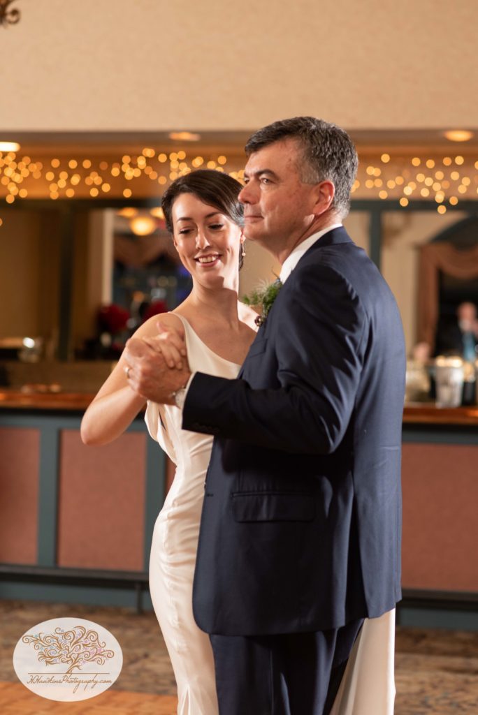Father and daughter dance at their wedding reception