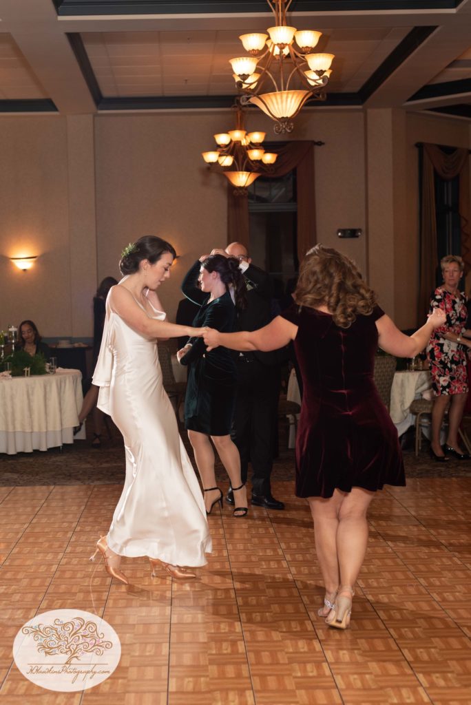 Bride and her friend ballroom dance