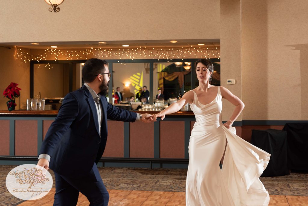 Bride and guest ballroom dance