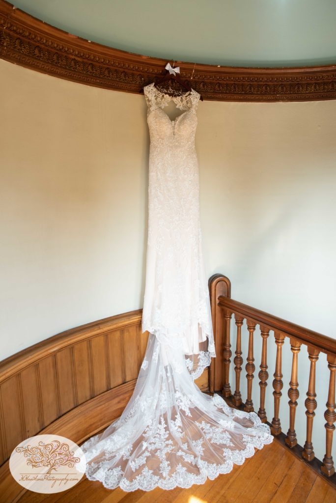 Wedding dress hanging in Belhurst Castle's tower suite in Geneva NY