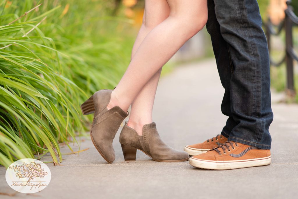 Shoes of Bride and groom during their engagement session at Syracuse's Creekwalk