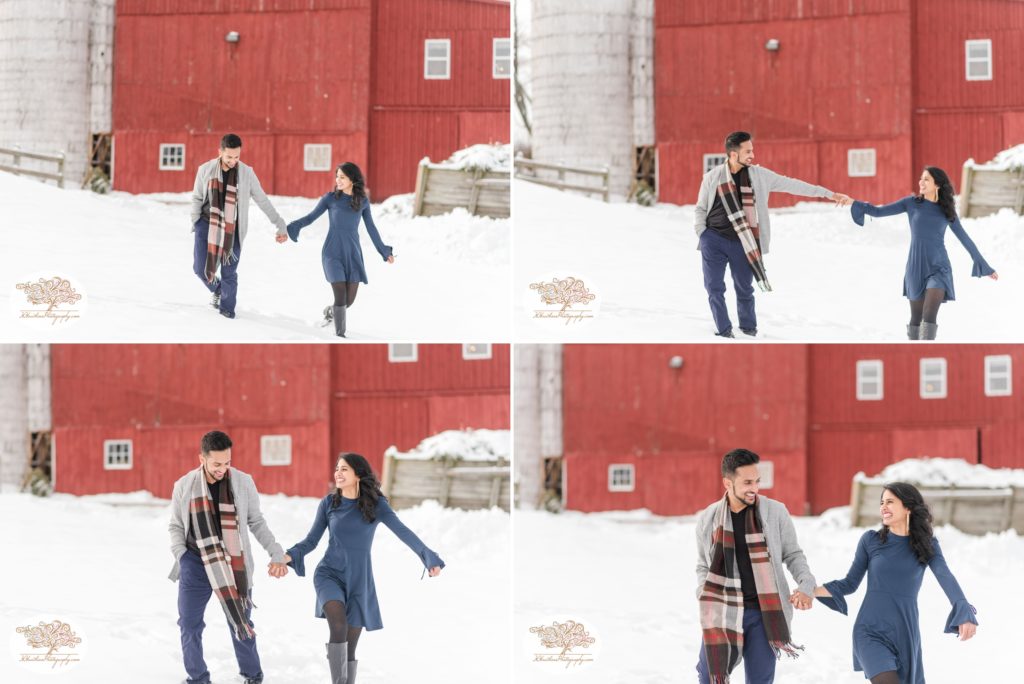 Bride and groom to be walk hand in hand during their snowy engagement pictures at Critz Farms in Cazenovia NY