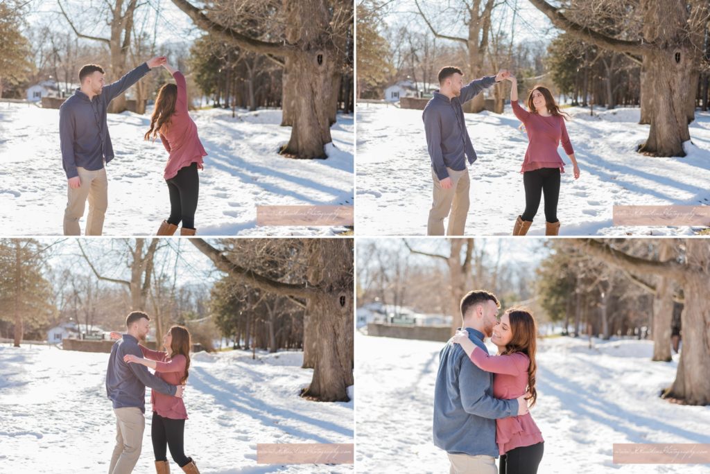 Groom spins bride to be in the snow on a sunny day in Syracuse NY for their engagement pictures