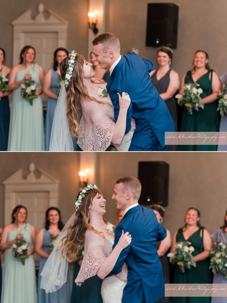 Bride and groom dip during their first dance on the floor during their wedding reception at the Springside Inn Auburn NY