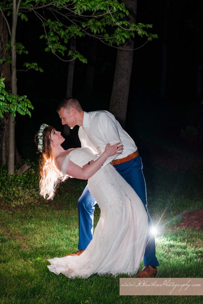 Night time picture of bride and groom at the end of their wedding day by Syracuse photographer at the Springside Inn Auburn NY