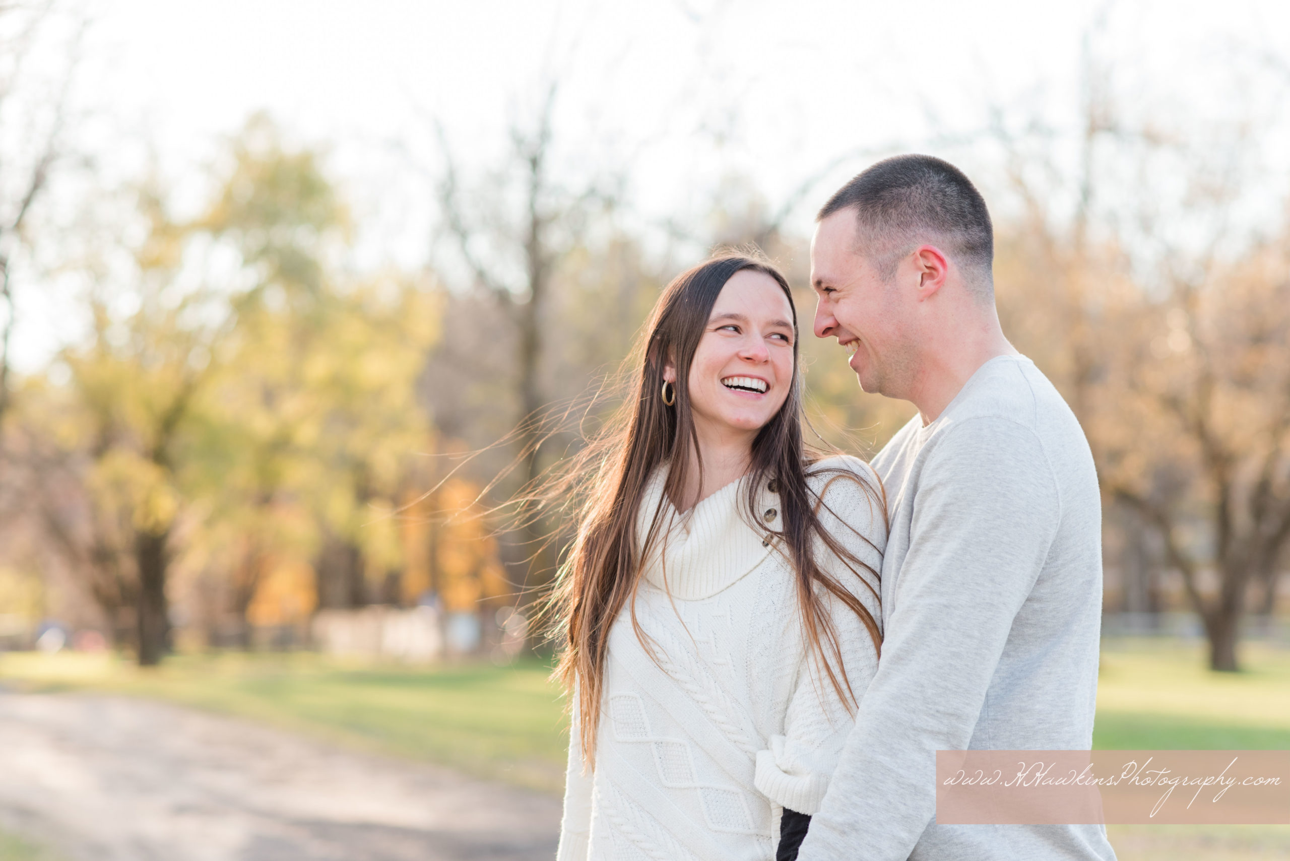 Late November engagement photos of engaged couple at Emerson Park in Auburn NY by Syracuse wedding photographer