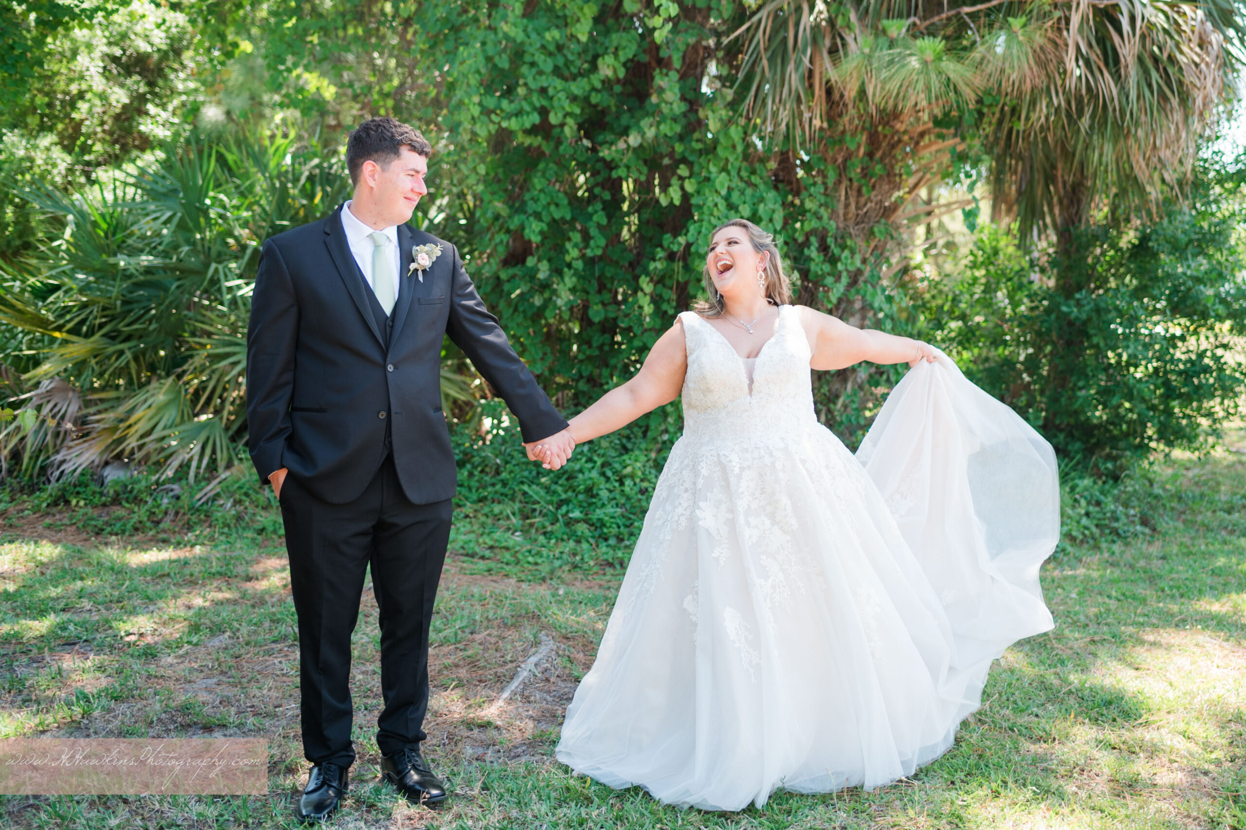 Bride and groom dance together outside Northside Presbyterian Church in Melbourne FL by Orlando wedding photographer